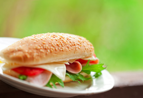 sandwich with ham,cheese and vegetables