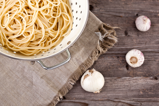 Fresh cooked spaghetti in a colander