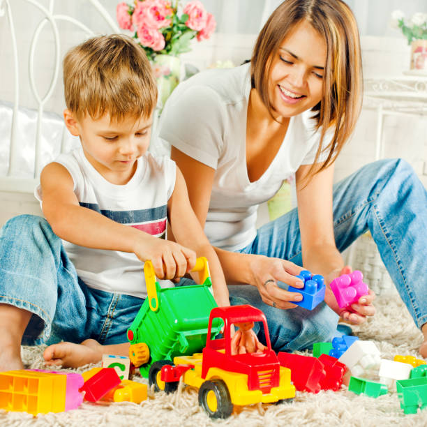istock Mother and son playing together 155154310