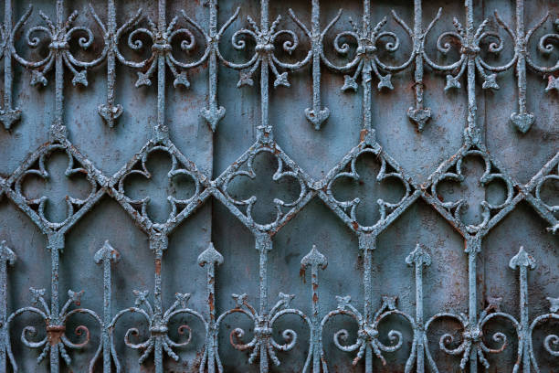 istock Ancient rusty forged fence decoration,  vintage decoration 1551543615