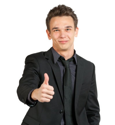 Young happy businessman with thumb up isolated on white (focused on face)
