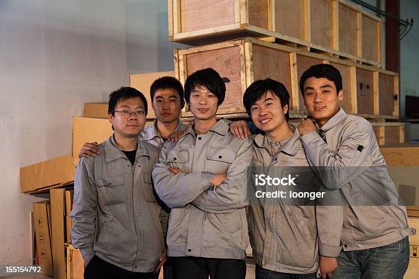 East Asian Manual Worker Team Stock Photo - Download Image Now - Factory, Organized Group Photo, Manufacturing Occupation