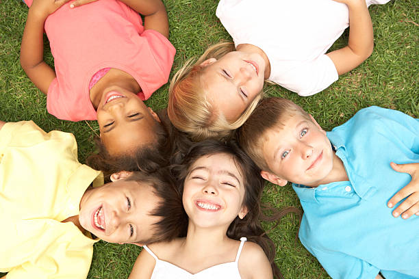 istock Overhead View Of Children Smiling At Camera 155156460