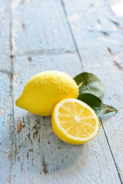 Fresh Lemons on blue rustic table