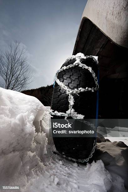 Closeup Of Car Tire With Snow Chains Stock Photo - Download Image Now - 4x4, Assistance, Black Color