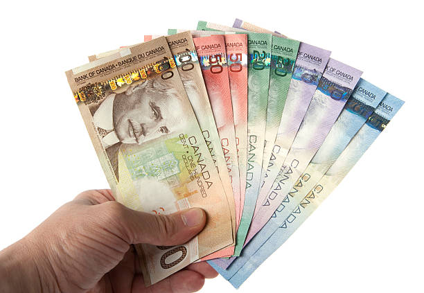 divisa canadiense - canadian currency fotografías e imágenes de stock