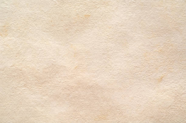 Closeup of a sheet of blank, handmade Mexican watercolour paper. Isolated on white.