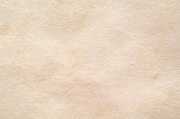 Handmade blank sheet of paper, isolated on white Closeup of a sheet of blank, handmade Mexican watercolour paper. Isolated on white. handmade paper stock pictures, royalty-free photos & images
