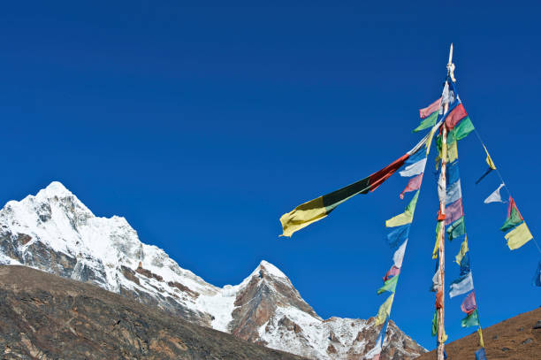 istock Prayer flags snow mountain summits Himalayas Nepal 155157115