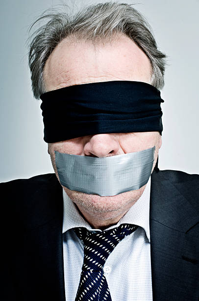 Gagged and Blindfolded Businessman  interroagtion stock pictures, royalty-free photos & images