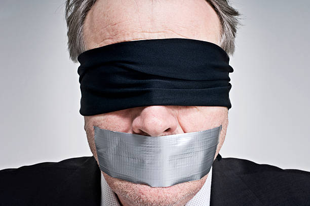 Gagged and Blindfolded Businessman  interroagtion stock pictures, royalty-free photos & images