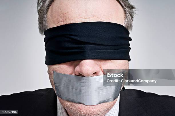 Gagged And Blindfolded Businessman Stock Photo - Download Image Now - Hostage, Blindfold, Men