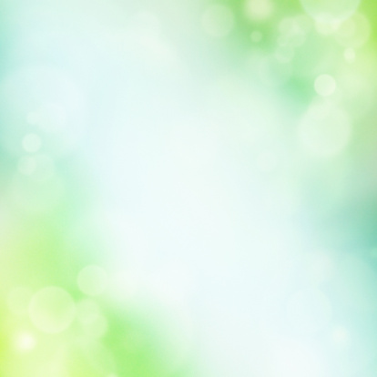 Abstract spring background with blue,cyan and green bubbles and color transitions. Lots of copy space,fine grain added.