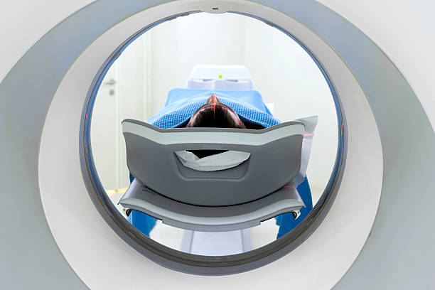 istock Man Receiving a Medical Scan, Rear View 155157229