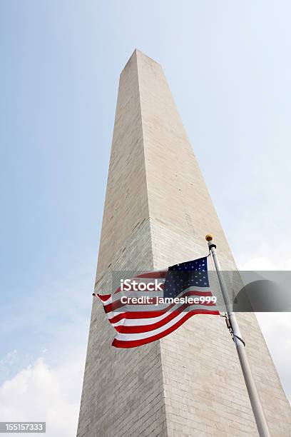 A Washington Monument With The American Flag Stock Photo - Download Image Now - American Flag, Capital Cities, City