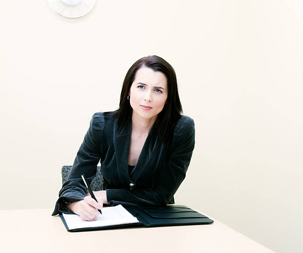 istock Beautiful Woman in Business Office 155157569