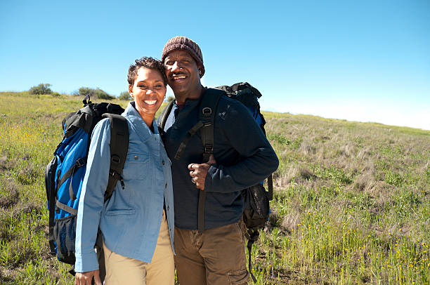 Mature African American Adult Backpackers stock photo