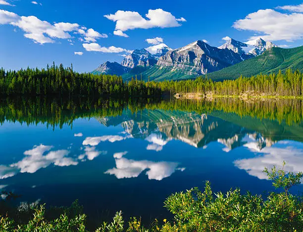 Candian Rockies Reflected On The Still Waters Of Lake Herbert,  Banff National Park, Canada 