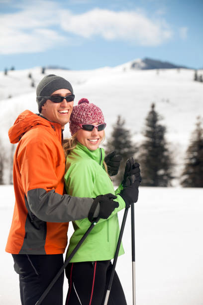 istock Couple Enjoys Back Country Skiing 155157838