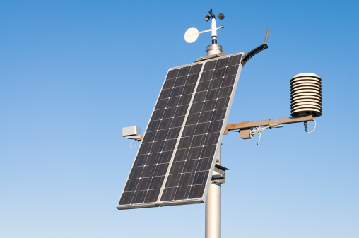 Equipment for monitoring air pressure, rainfall, temperature, wind speed and direction.  Powered using a solar panel and with equipment for radio transfer of weather information.  