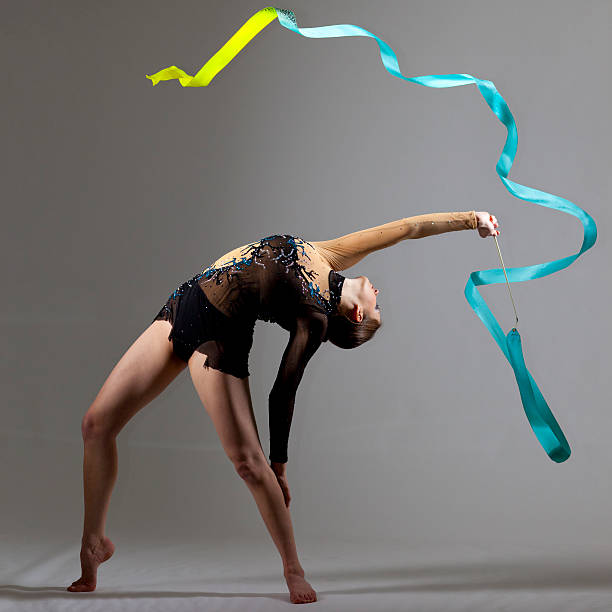 istock Gymnast girl on grey background 155157989