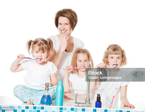 Teeth Brushing Stock Photo - Download Image Now - Brushing Teeth, Family, Child