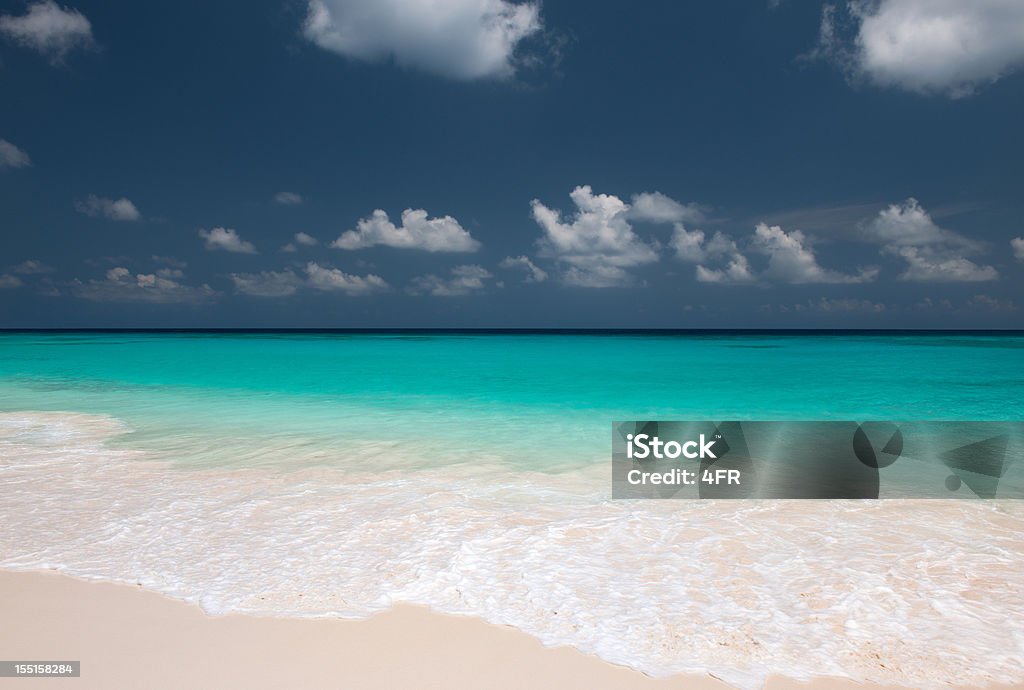 Secluded Tropical Paradise Beach, Seychelles (XXXL) Secluded Paradise Beach. Nikon D3X. Polarizer! One of the most idyllic beaches in the world! (XXXL) Bay of Water Stock Photo