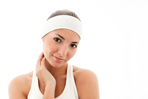istock Young Woman in a Cosmetics Headband - Isolated 155158287