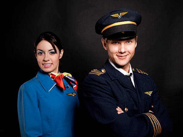 istock Portrait of an Airline Pilot and Flight Attendant 155158358