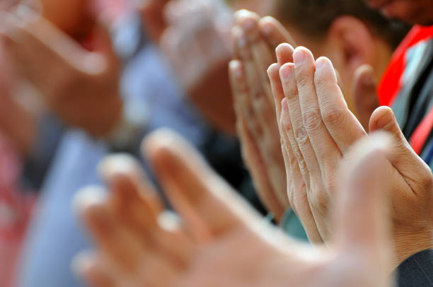 istock Praying hands in Tahrir Square - Cairo, Egypt 155158690