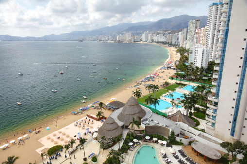 Aerial shot of oceanfront highrise condominiums in Acapulco, Mexico