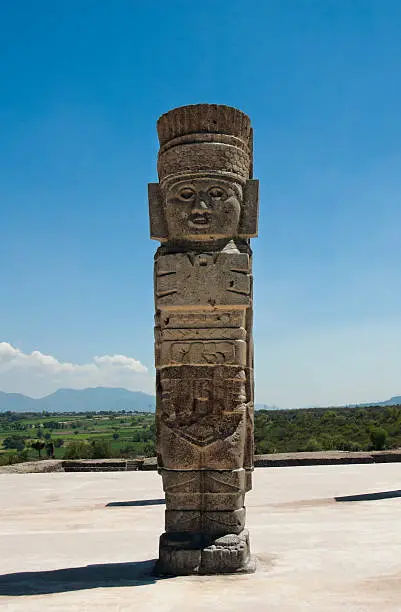 The ruins of an ancient mesoamerican city from the Toltec empire in Tula, Mexico. The remaining columns of the temple are sculptures of warriors sometimes referred to as the Atlantians.