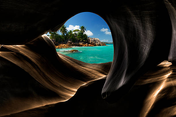 View from a cave  la digue island photos stock pictures, royalty-free photos & images