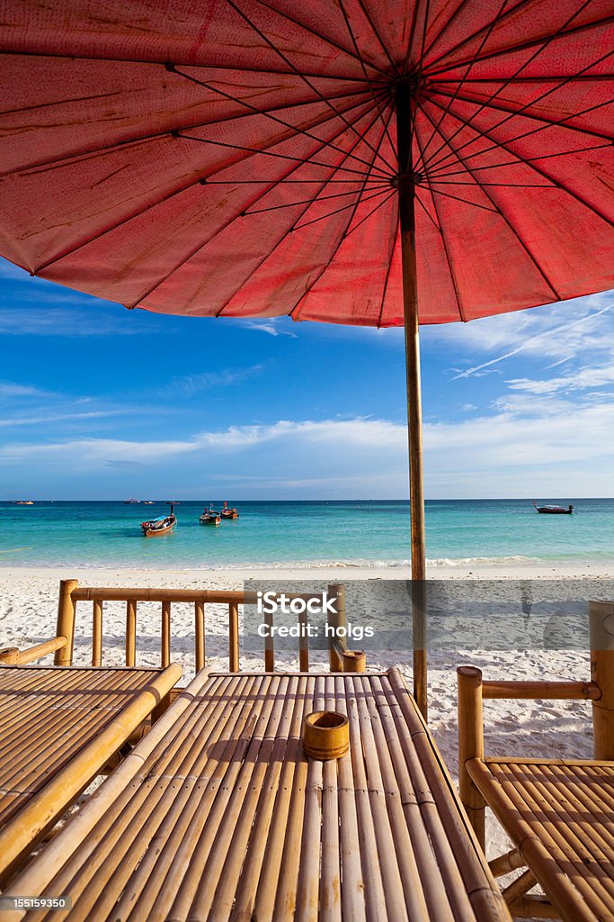 Table by the Beach in Thailand Table by the Beach on Pattaya Beach, Koh Lipe in Thailand Pattaya Stock Photo