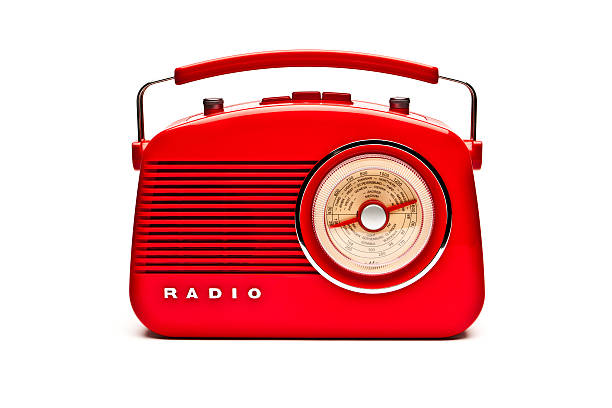 Red retro radio set isolated on white stock photo