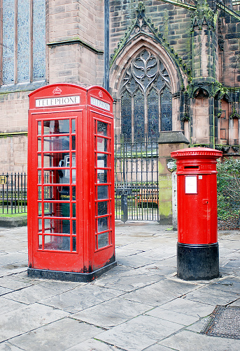 Typical red telephone booth and postbox in England