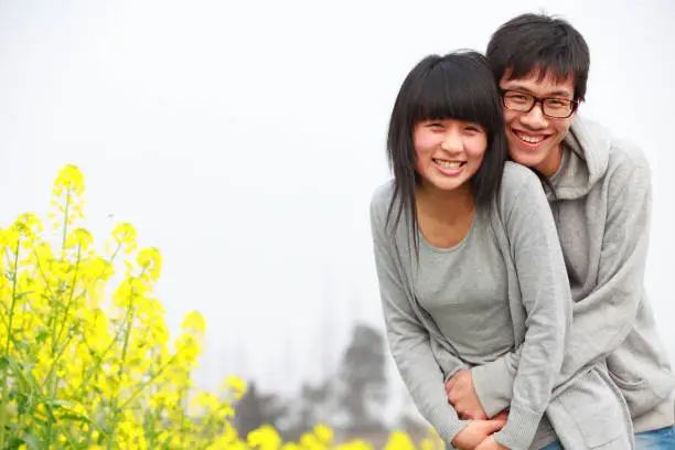 Photo of happy young couple in the countryside