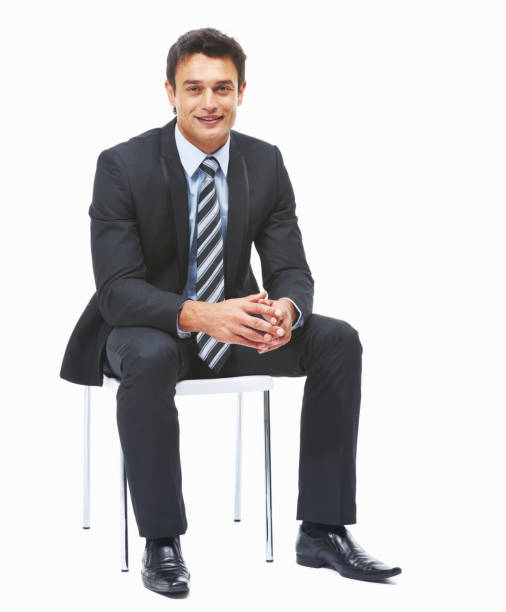 istock Business man sitting against white background 155159525