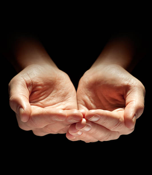 istock Hands of the Needy, Poor or Homeless 155159711