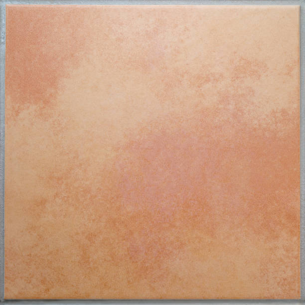 istock One apricot colored terracotta tile isolated background XL 155160272