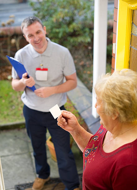 istock Salesman giving woman his card 155160518