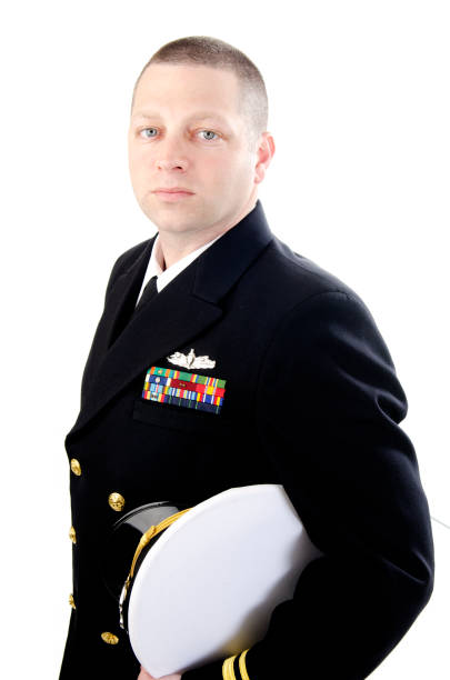 Male Caucasian Naval Officer in Dress Blues Isolated on White Male Naval Officer Isolated on White us sailor stock pictures, royalty-free photos & images