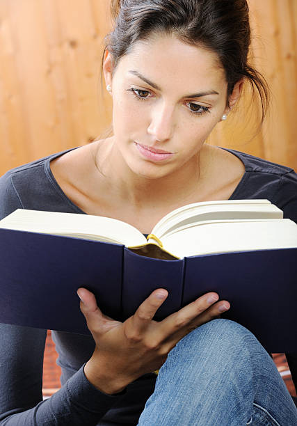 istock Beautiful woman reading a book (XXXL) 155161113