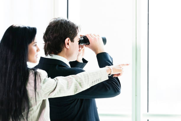 istock Spying business couple 155161554