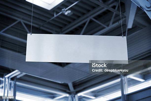 Hanging Metal Billboard In Business Room Stock Photo - Download Image Now - Banner - Sign, Hanging, Indoors