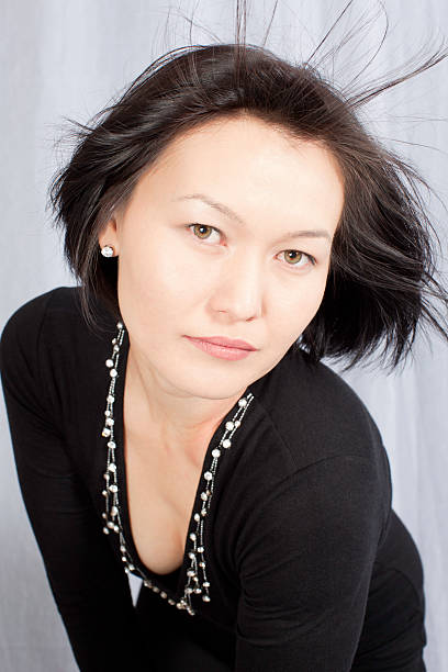 istock Kazakh Girl: Green Eyes and swinging hairs 155161873
