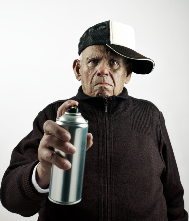grandfather with a cap and a spraycan