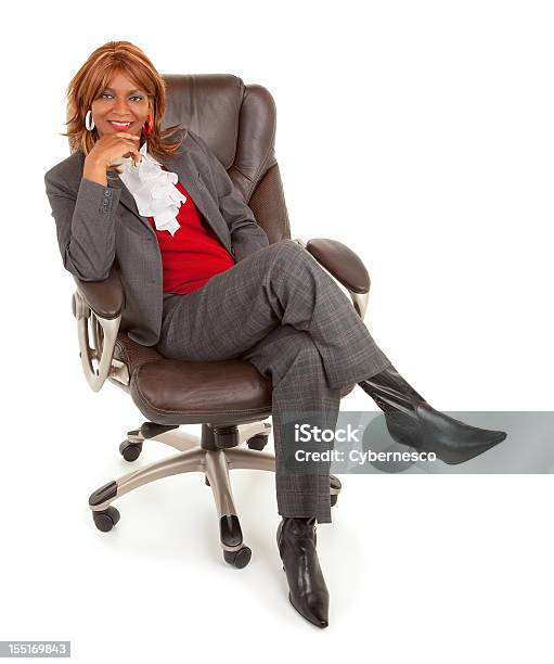 African American Businesswoman Sitting On A Leather Chair Stock Photo - Download Image Now