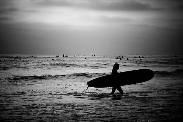 istock Female Surfer on the Beach 155170314