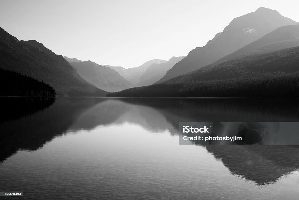 Black and white photo of Bowman Lake Bowman Lake in Glacier National Park Black And White Stock Photo